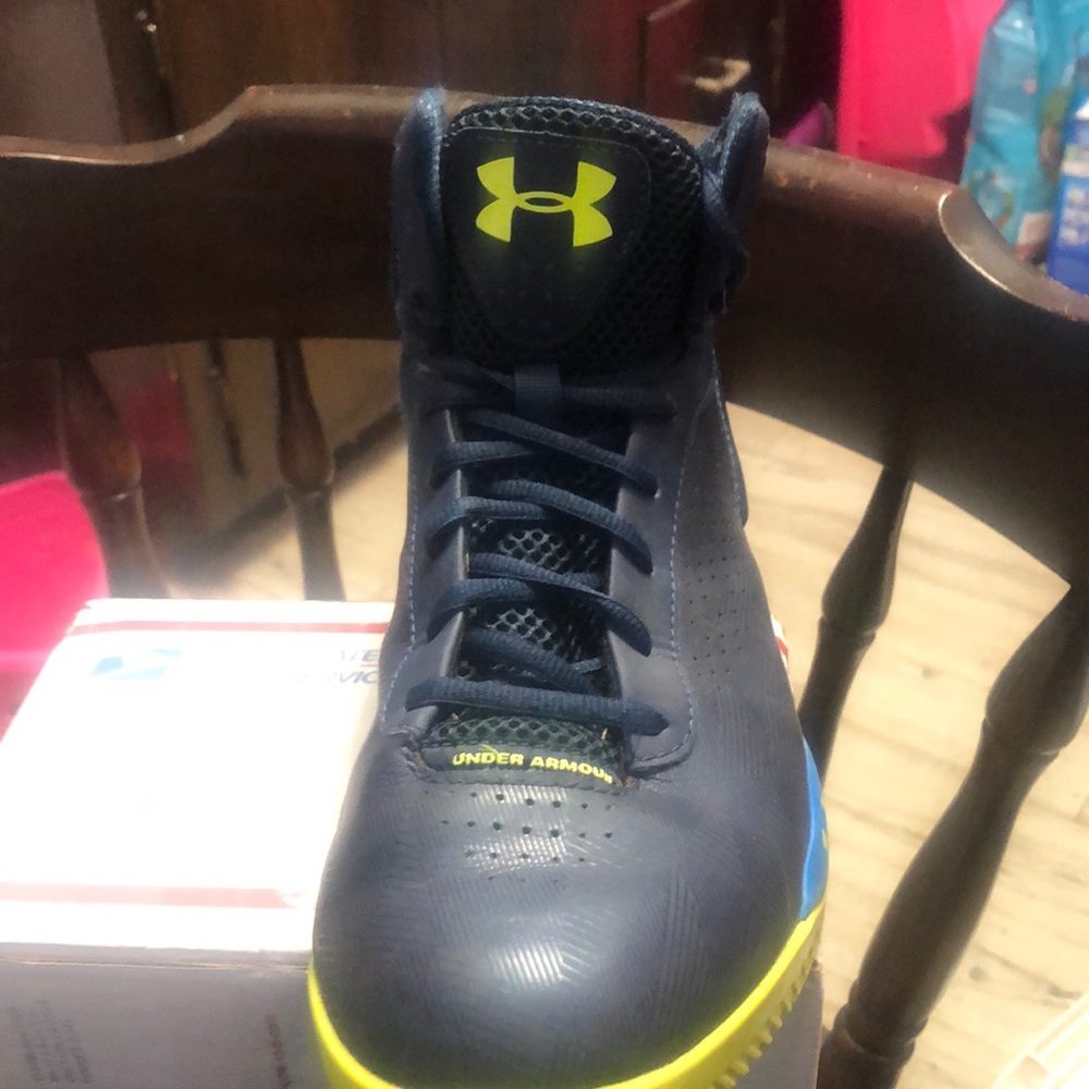 High top all leather Under Armor sneakers.